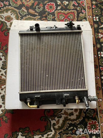 Радиатор Mazda Demio