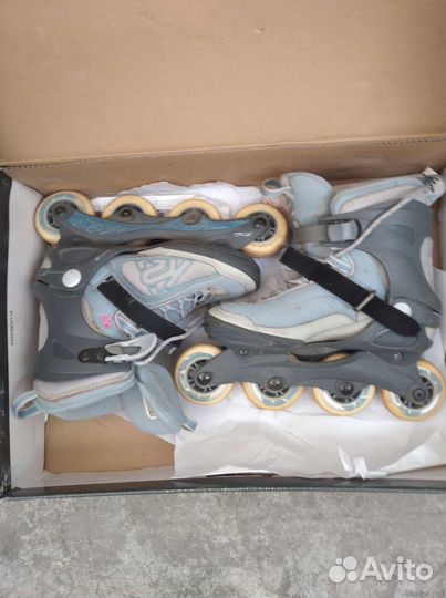 Роликовые коньки