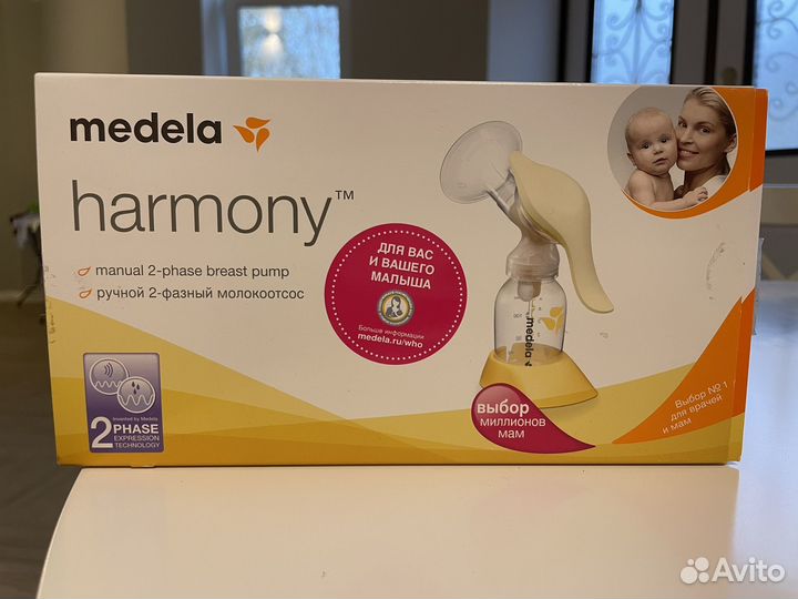 Молокоотсос medela ручной + пакеты для молока
