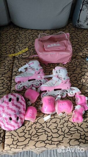 Роликовые коньки