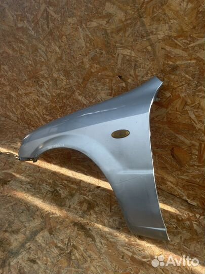 Переднее крыло Mazda Familia S-Wagon