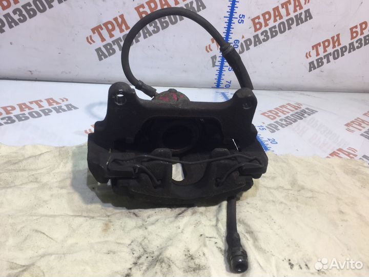 Фольксваген Пассат Суппорт передний Лев