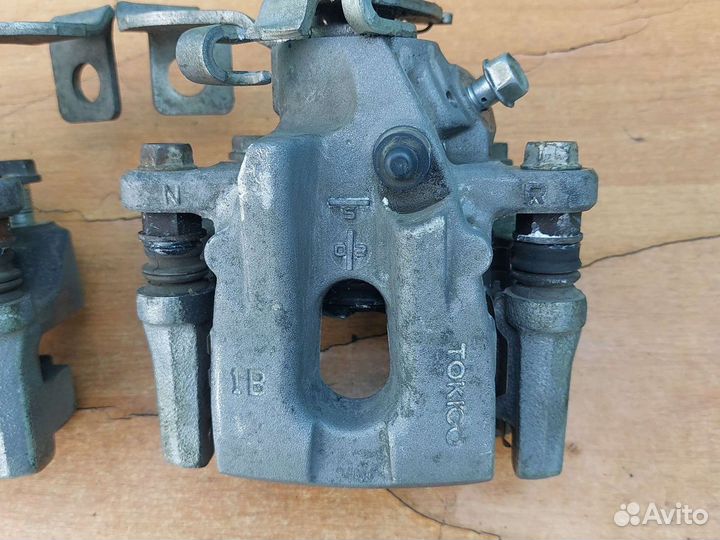 Суппорт тормозной задний тойота королла 150