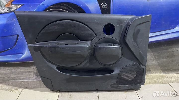 Обшивка двери передняя левая Chevrolet Aveo