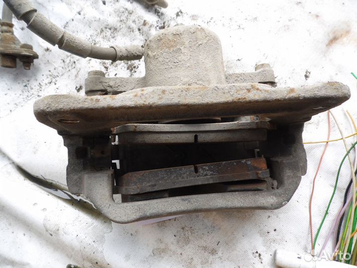 Суппорт тормозной передний левый Mazda Mazda 6 (GH