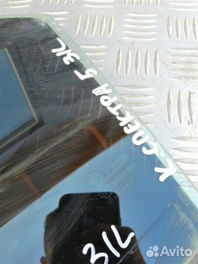 Стекло двери опускное заднее левое Kia Spectra LD