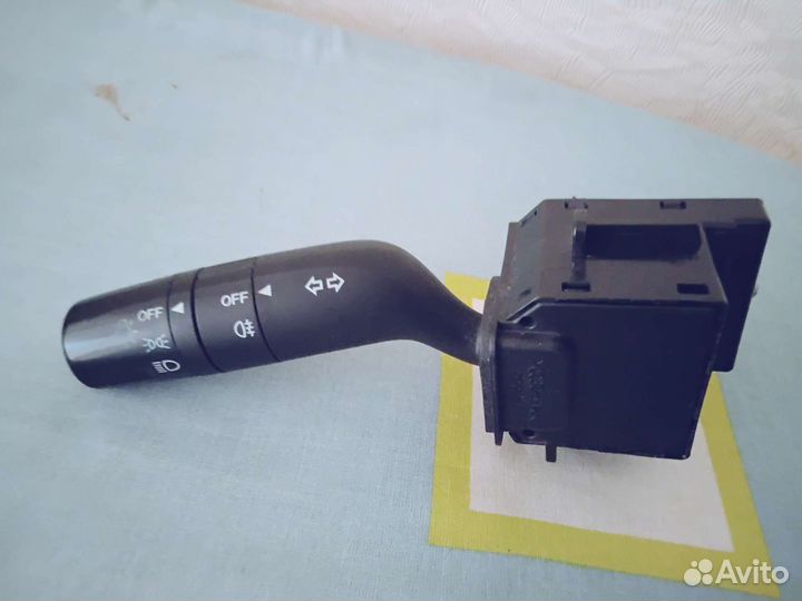 Под рулевой переключатель света на Мазду 3 бл