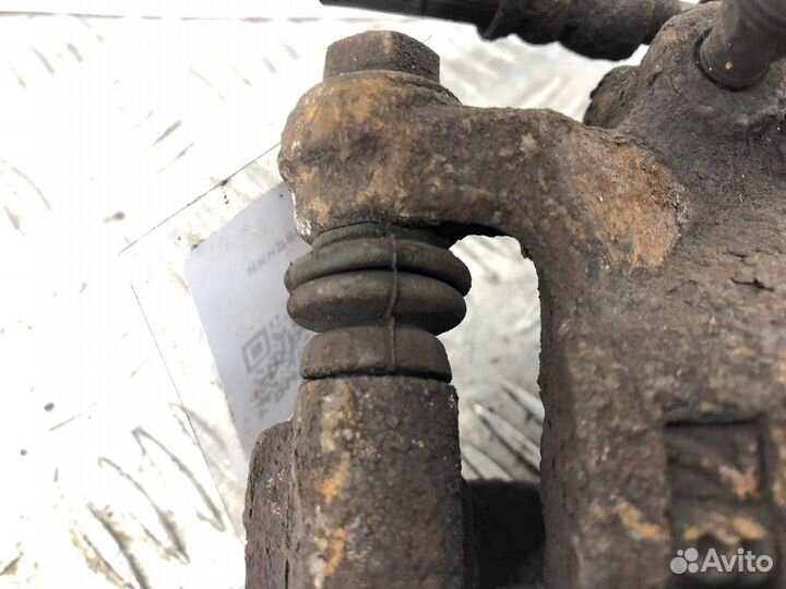 Суппорт задний левый L Nissan X-Trail