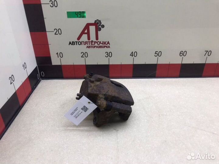 Суппорт передний левый Nissan Primera P12