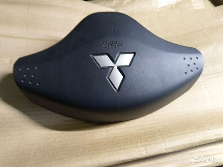 Подушка безопасности в руль Mitsubishi L200 IV