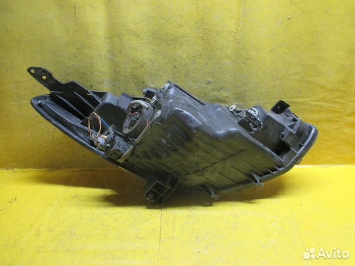 Фара левая Mazda Demio dejfs