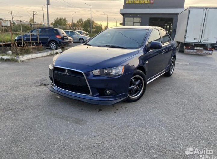 Передняя губа rallyart на Mitsubishi Lancer X