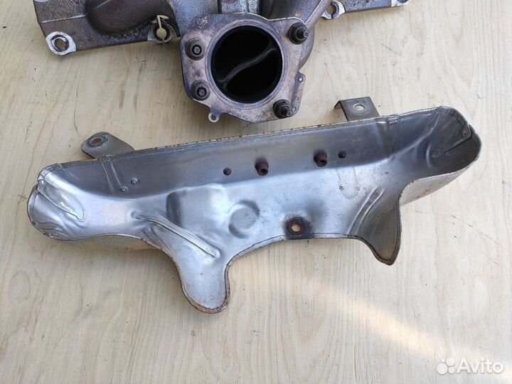 Коллектор выпускной A20NFT Opel Astra J Insignia