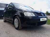 Volkswagen Touran 1.9 AMT, 2006, 156 700 км, с пробегом, цена 620 000 руб.