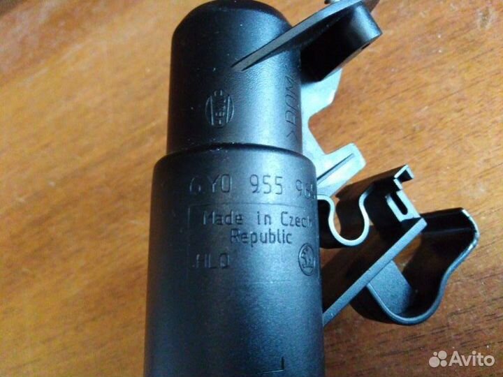 Форсунка омывателя фары левая Skoda Fabia 1999