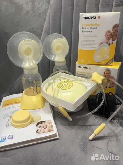 Молокоотсос medela электрический