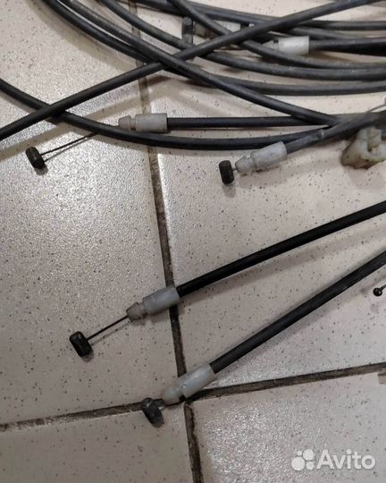 Трос лючка бензобака Mitsubishi Pajero Sport