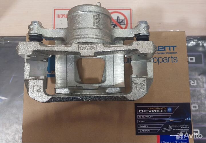 Суппорта передние лев./прав. Aveo/Kalos