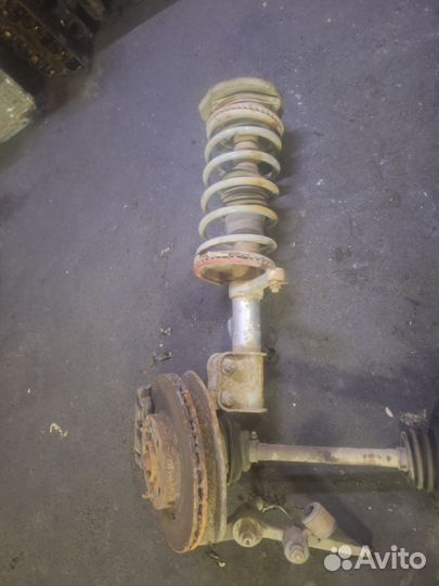 Передние стойки всборе ваз 2112