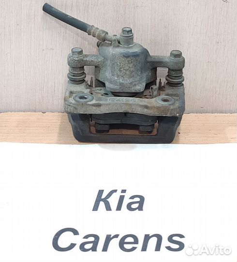 Суппорт тормозной задний Rh Kia Carens, 2008г