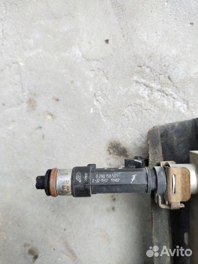 Топливная рампа с форсунками Opel Corsa D