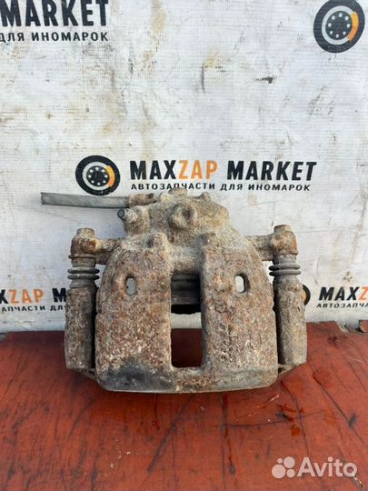 Суппорт передний правый Mitsubishi Colt 1.5 2006