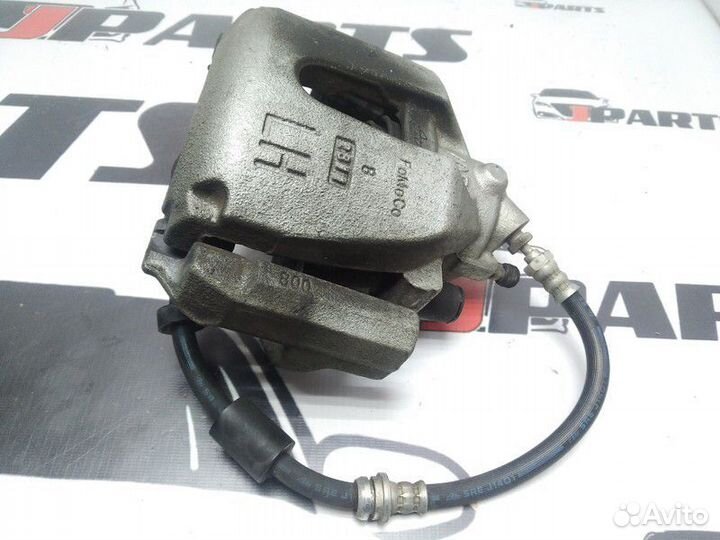 Суппорт тормозной передний Mazda 3 BL (2008—2011)