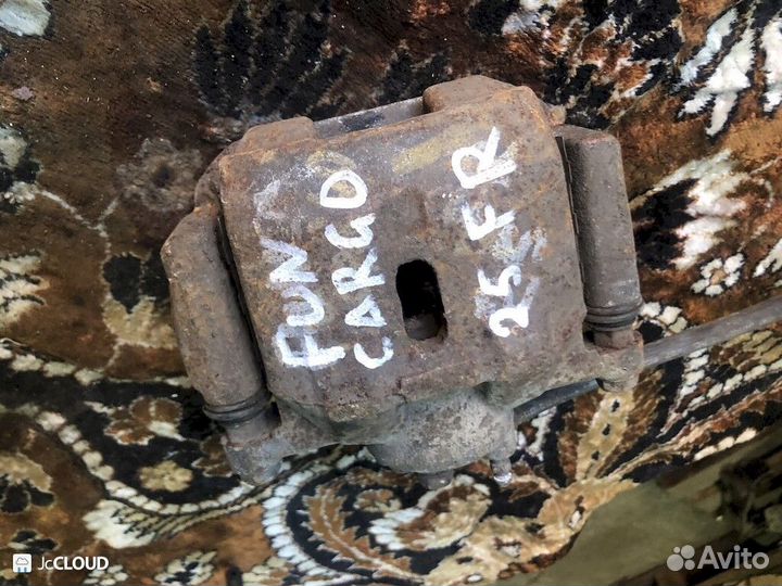 Суппорт на toyota funcargo NCP25 1NZ