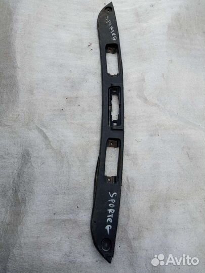 Kia Sportage 2010 накладка подсветки номера