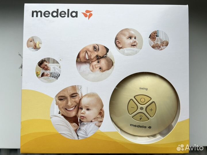 Молокоотсос medela swing