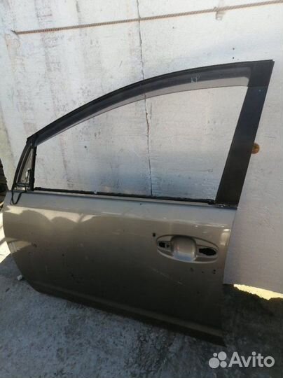 Дверь передняя левая Toyota Prius NHW20