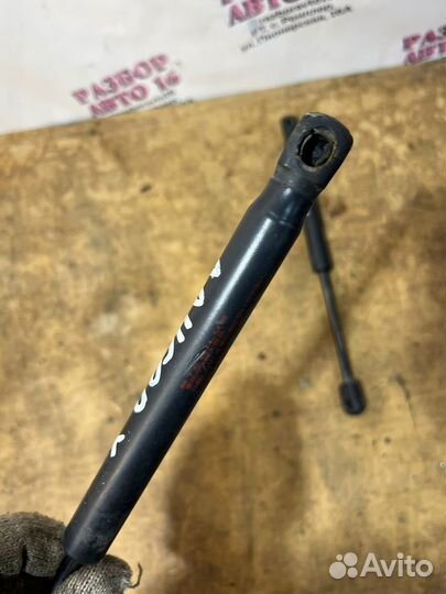 Амортизатор крышки багажника Mitsubishi Lancer 10