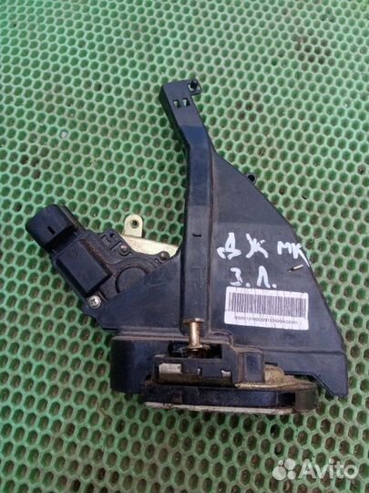 Замок двери задний левый Geely Mk