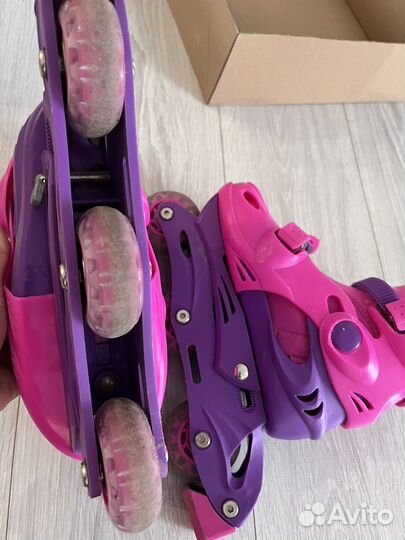 Роликовые коньки