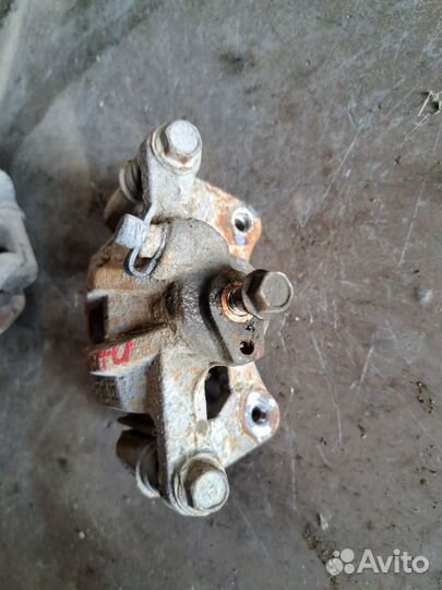 Суппорт задний Chevrolet Lacetti