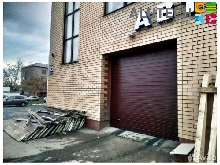 Секционные ворота для гаража alutech
