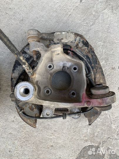 Кулак поворотный задний левый Bmw e39