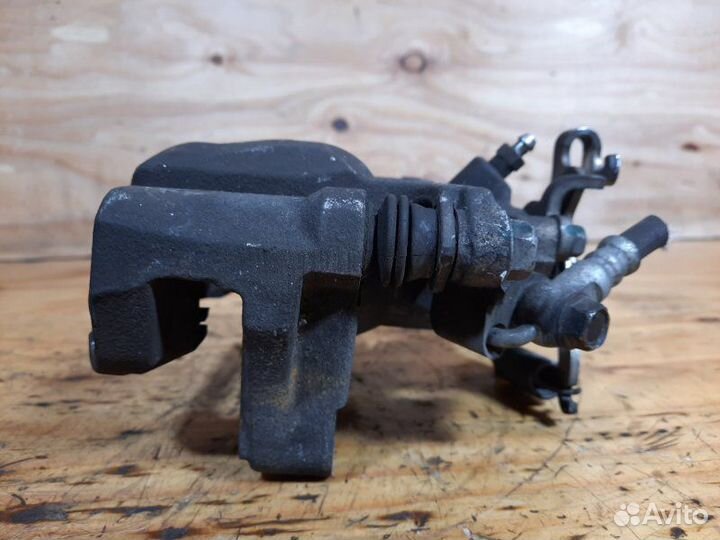 Суппорт задний левый Mazda Atenza GJ2FW shvptr