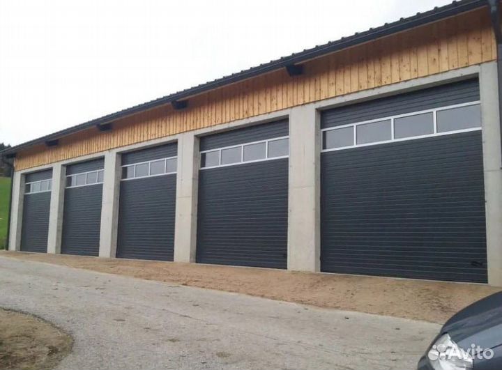 Подъемныe cекциoнные вopота Алютех