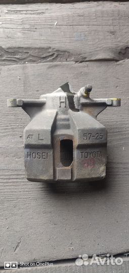 Суппорт тормозной передний toyota Corona, Carina