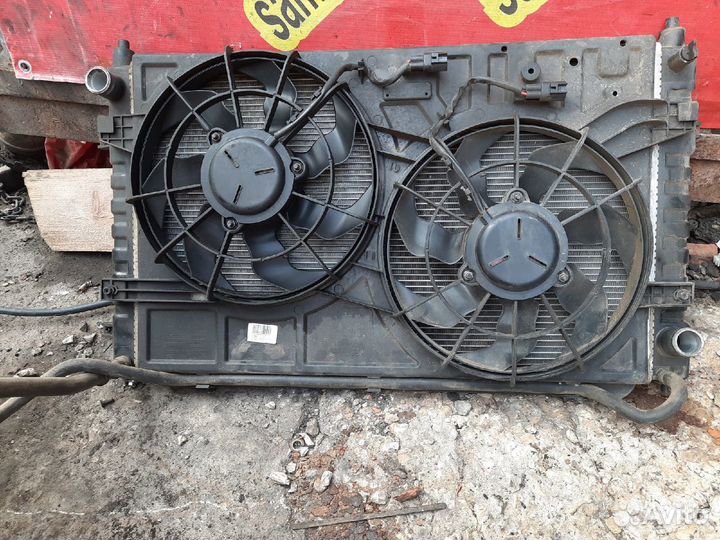 Диффузор в сборе Джили Эмгранд ес 7