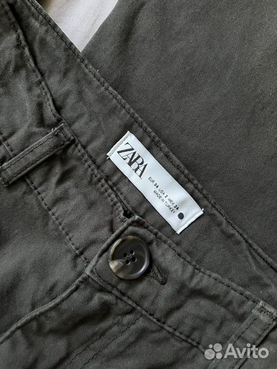 Джинсы хаки с накладными карманами 42