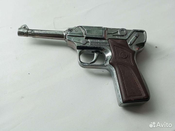 Пистолет на пистонах железный