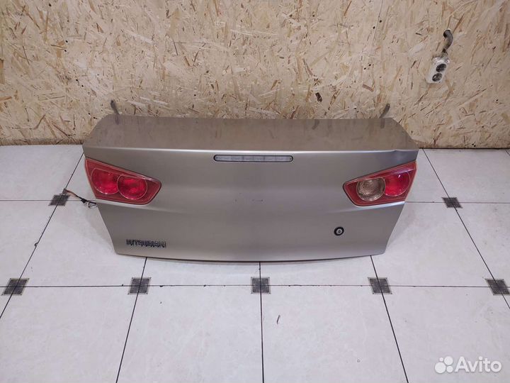 Лансер 10 крышка багажника