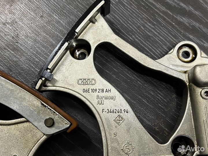 Натяжитель цепи VAG 06E109218AH