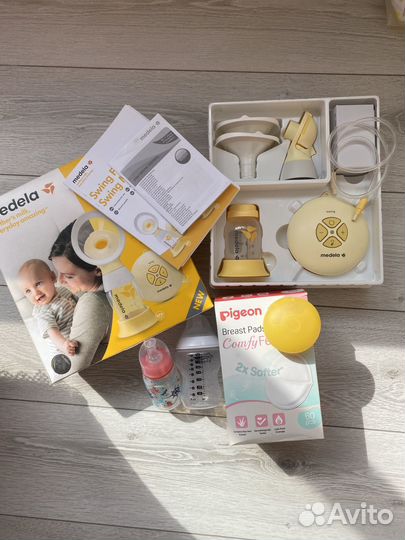 Молокоотсос medela swing flex