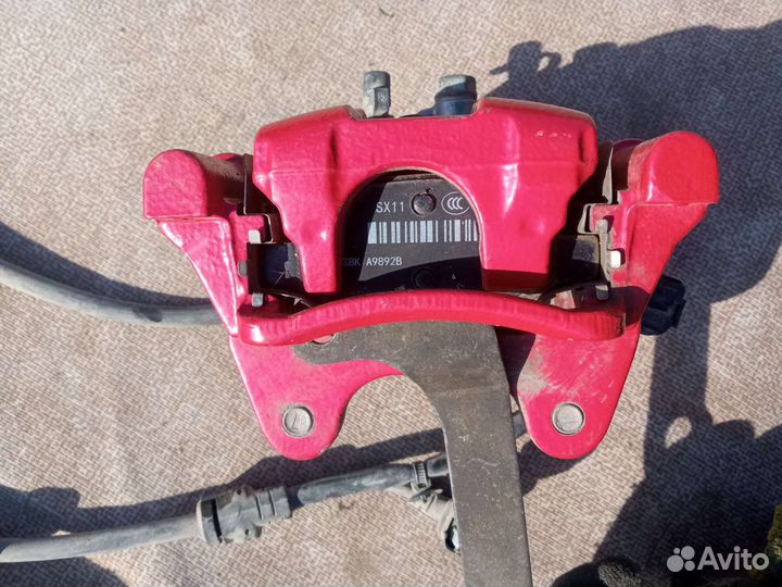 Суппорт задний левый Geely Coolray SX11