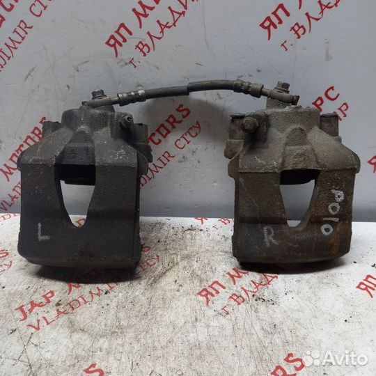 Суппорт тормозной передний Volkswagen Polo хэтчбек