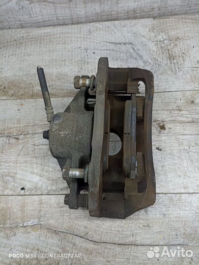 Суппорт тормозной передний правый Kia Cerato G4ED