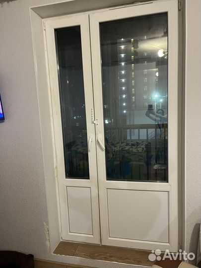 Балконная пластиковая дверь